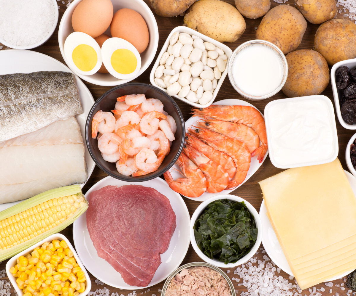 A table filled with foods that include iodine to support thyroid hormone production.