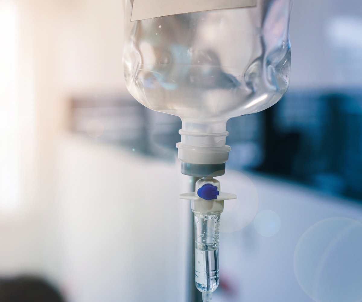 a close-up of an IV infusion bag in a clinic.
