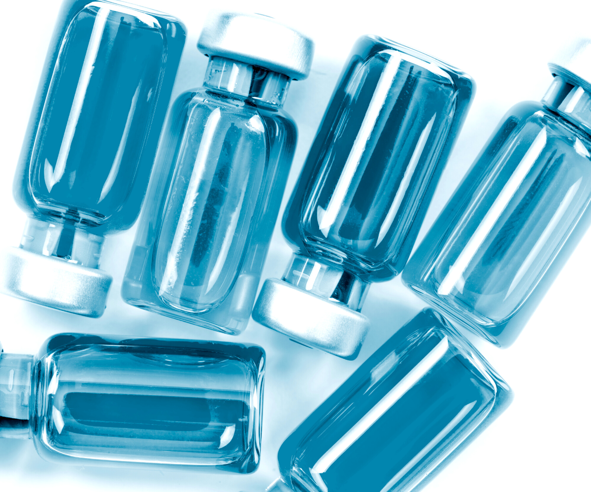 Several blue injection vials to indicate Trimix penile injections.