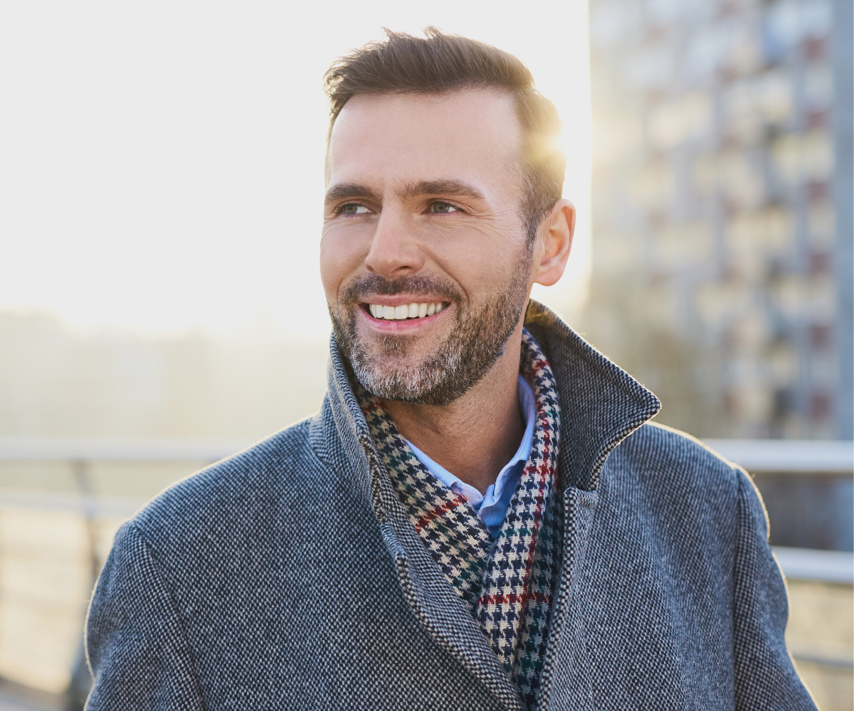 Man smiles as he works on increasing his testosterone