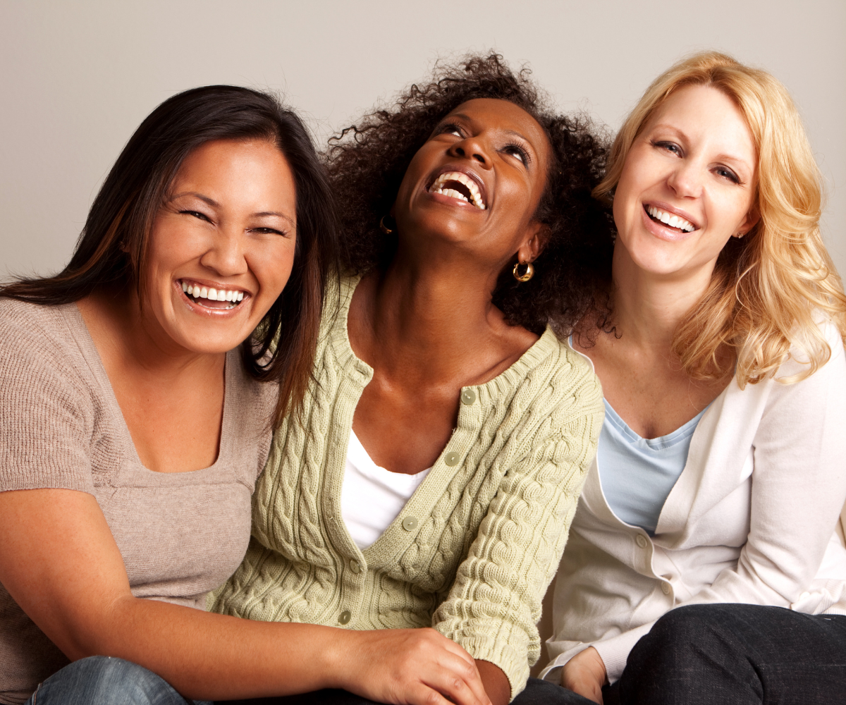 Women smiling and laughing together
