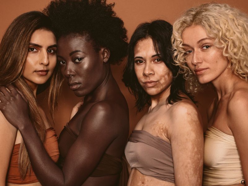 GHK-Cu - four women with glowing skin.